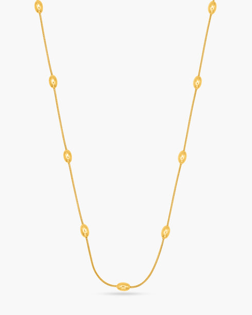 Gold necklace on a white background